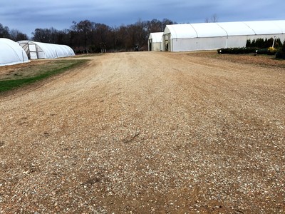 An L&Q stabilized unpaved road, dust and erosion are decreased.