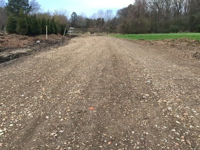 Compacted and stabilized unpaved road